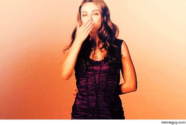 Mila Kunis blowing you a kiss
