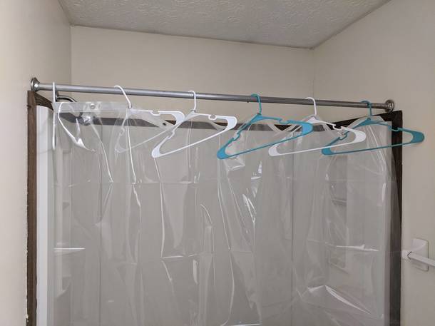 Moved to a new place the shower liner I bought didnt come with rings to hang it So I hung it up using this one weird trick interior designers hate me