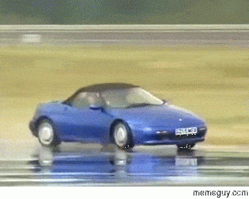 MRW driving on a rainy day and I see a girl in a sundress