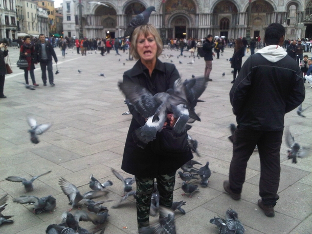 My aunt getting acquainted with the local bird life in Italy