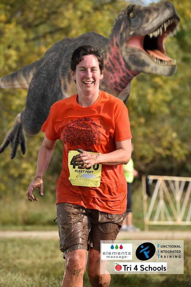 My aunt posted a picture of her crossing the finish line in a marathon so my dad photoshopped a T-Rex in behind her