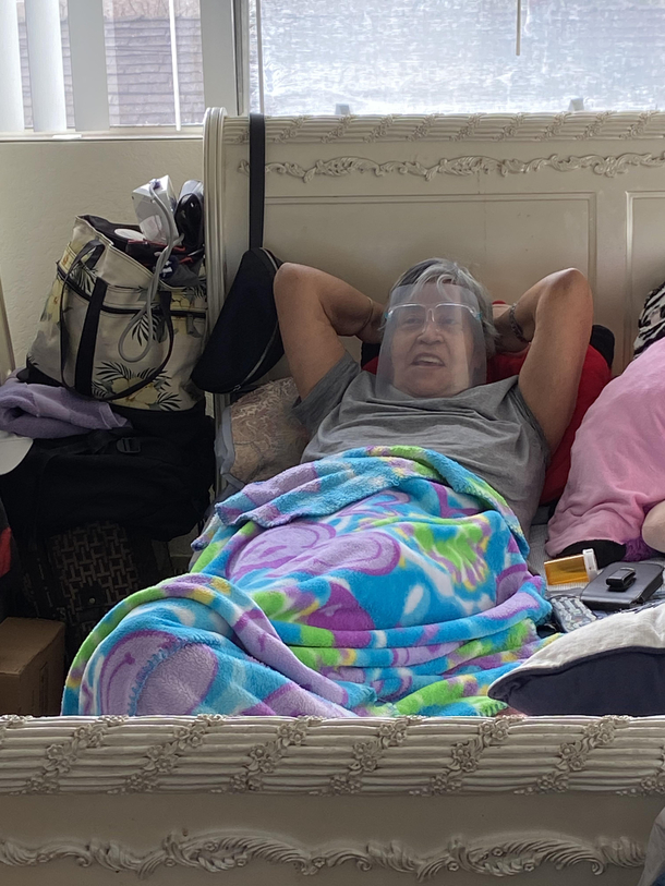 My aunt taking CORONA WAY too seriously This is how she watches TV