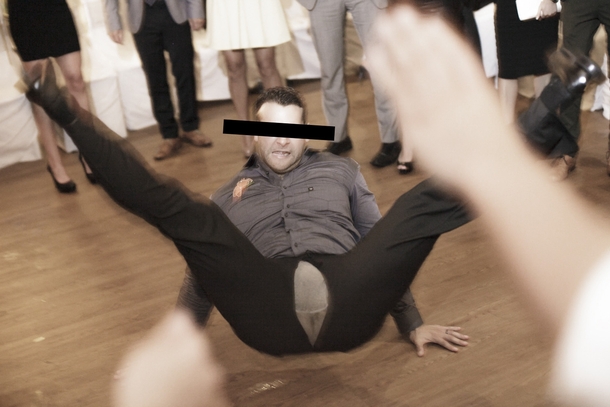 My brother is a wedding photographer and caught this guys pants ripping right as he got down to break dance