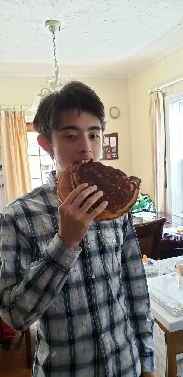 My brother tends to get the portions for food wrong when he cooks and makes my Mom upset for using too much So here he is with his giant pancake