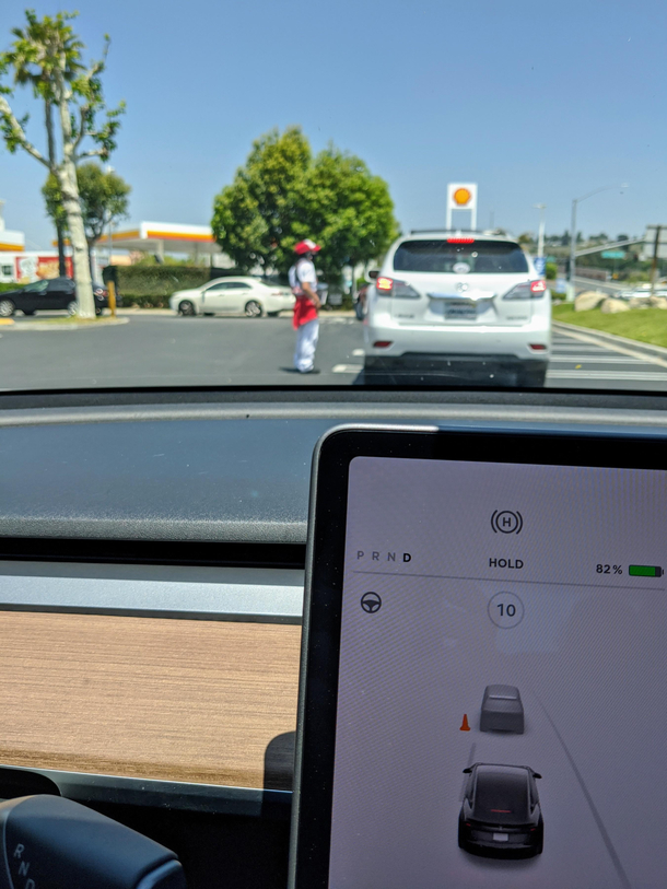 My car thinks the drive thru attendant is a cone