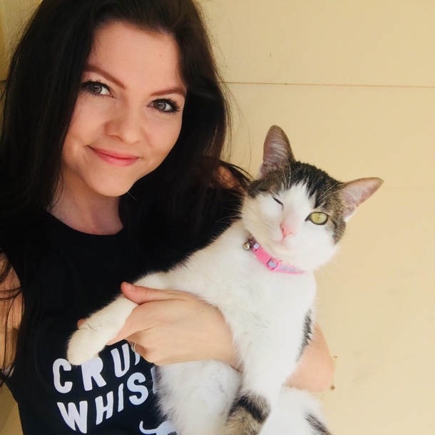 My cat is such a flirt Shes mastered the wink