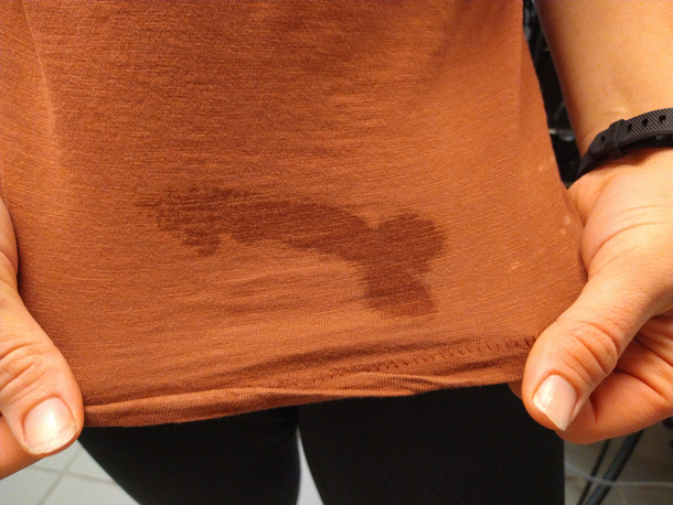 My co-worker leaned up against a wet counter 