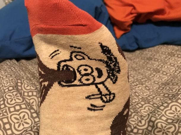 My coffee socks Turn your head to the left and he looks happy and like hes being filled up with a thumbs up Turn it to the right and he looks mortified with a unibrow and throwing up with a thumbs down
