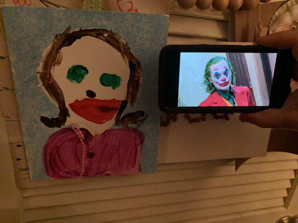 My cousin has green eyes and likes to wear lipstick and her  year old daughter wanted to draw a nice picture of her