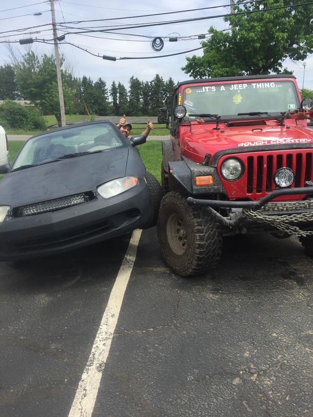 My coworker did a thing with his cavalier to my Jeep Thought you guys could appreciate it