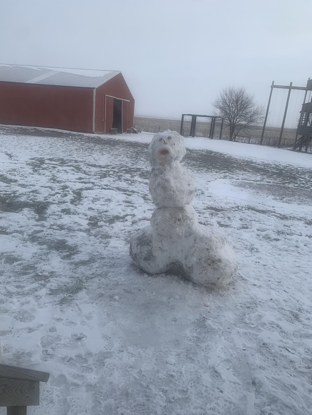 My dad and little sister  made a snowman