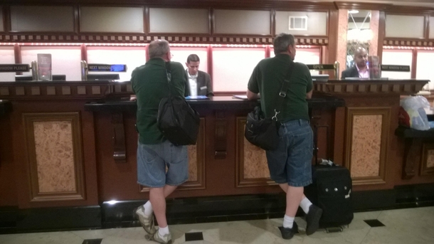 My dad checking into a hotel They were both completely oblivious