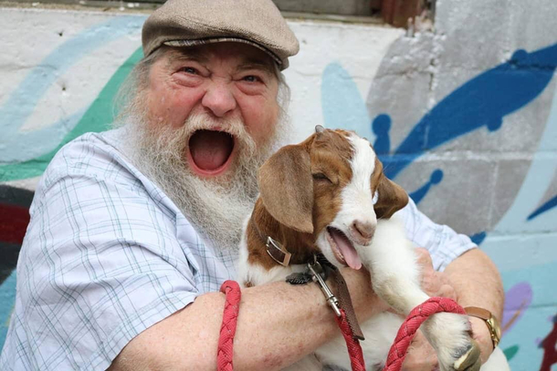 My dad got to hold a rescued  week old baby goat