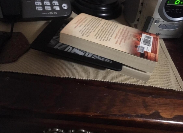 My dad likes reading so I got him a Kindle for his birthday He is using it as his bookmark