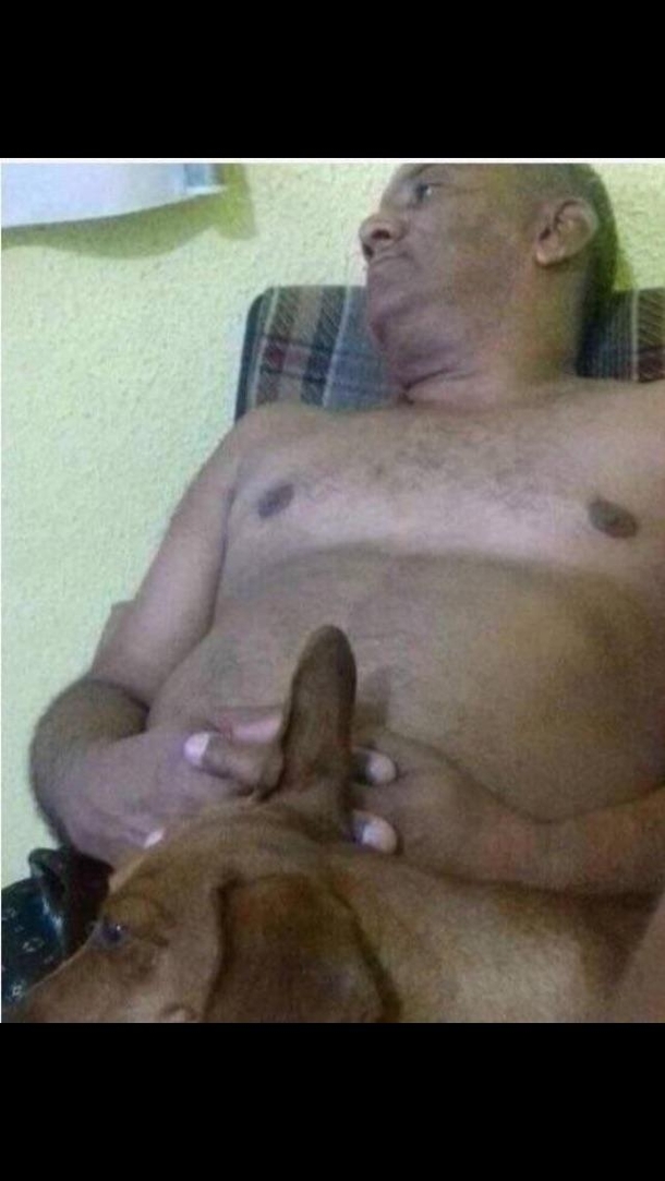 My dad relaxing after work  Larry the dog 
