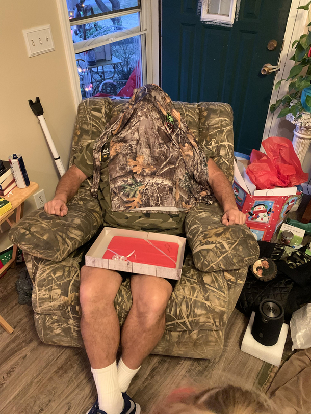 My dad showing off his new shirt he got for Christmas