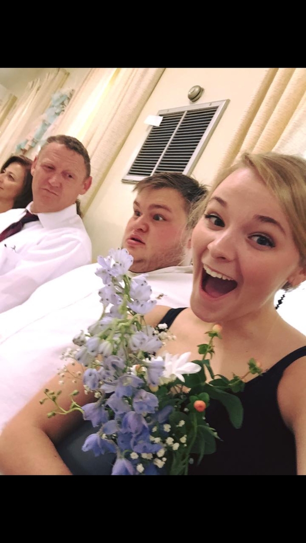 My friend caught the bouquet That is her boyfriend in the background