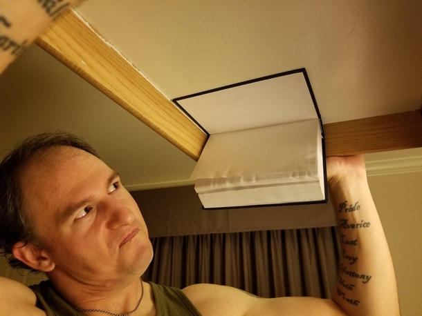 My friend is at a hotel Someone glued the Bible into the drawer 
