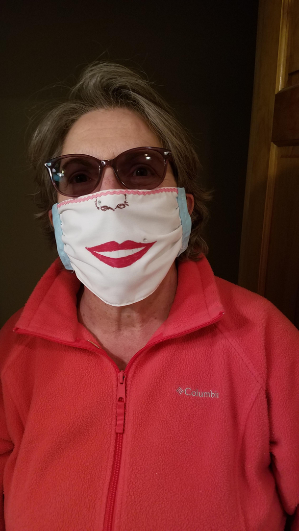My Grandmother gave herself a nose piercing amp lip piercing on the mask she made