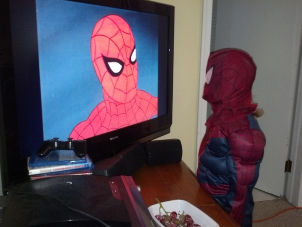 My husband took this photo of my daughter watching Spiderman
