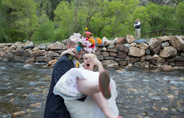 My husband tried to pick me up while standing dangerously close to the creek after our wedding