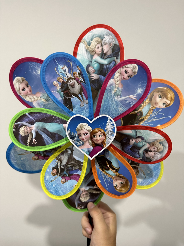 My in-laws bought this Frozen-themed pinwheel for my daughter One of these things is not like the other