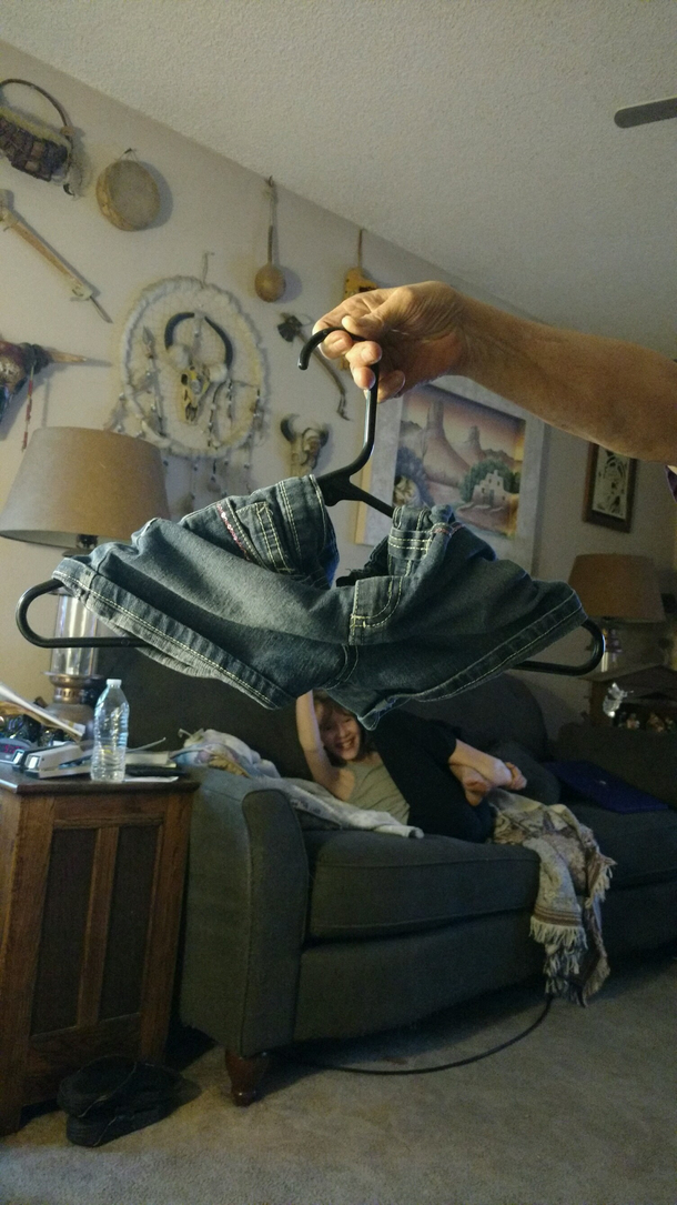 My kid didnt want to fold her laundry so proceeded to hang everything in the closet instead I call this piece Short Cuts