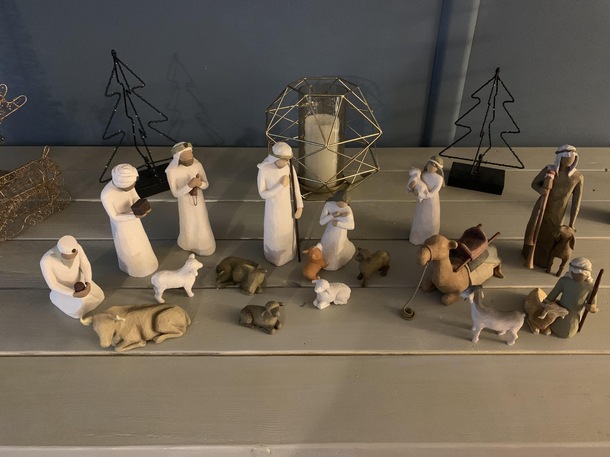 My kids kept leaving a little corgi toy on the table with my nativity scene So I just went ahead and added him in It seemed like the most realistic place to put him
