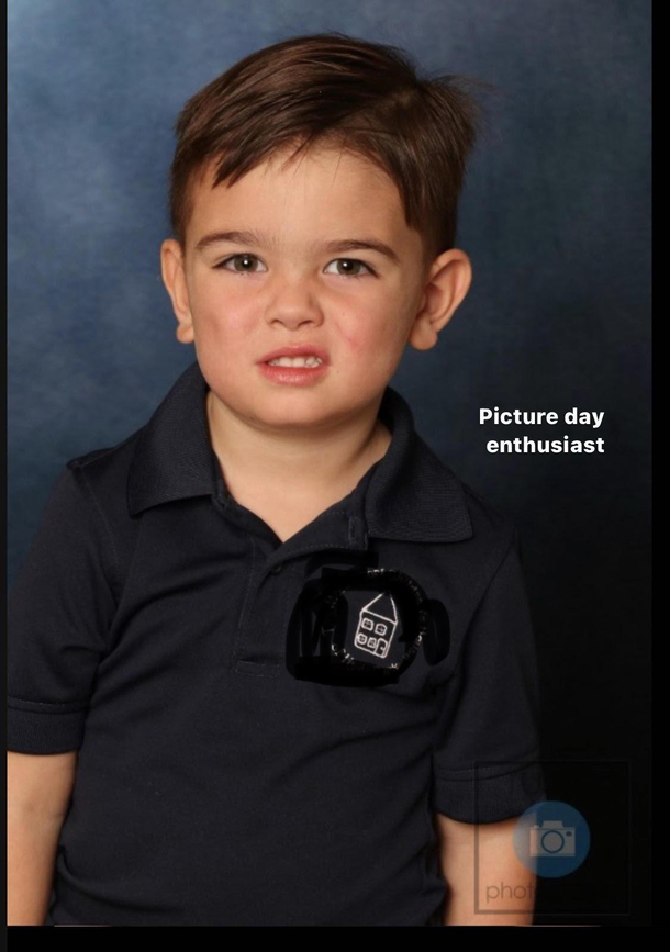 My lunatic kid insisted on cutting his own hair before picture day I think he knew exactly what look he was going for