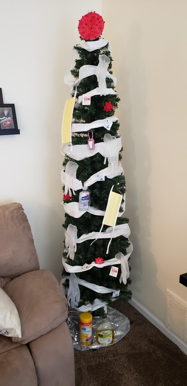 My mom kept up her Christmas tree and keeps updating it for each holiday May I present the Quarantree