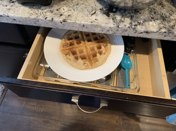 My mom swore she already made me a waffle but we couldnt find it So she made another one and I grabbed a fork