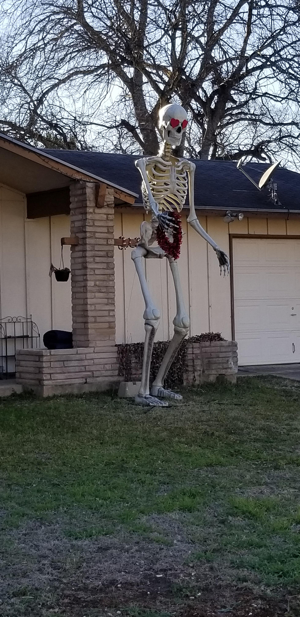 My neighbors have the -foot Home Depot Skeleton and keep it up all year decorating it for every holiday Heres their V-Day decor