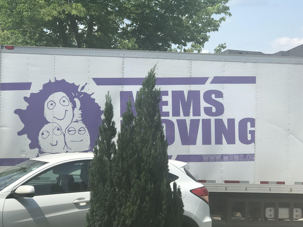 My neighbours were moving today and this was the moving truck thats pulled up MEMS MOVING