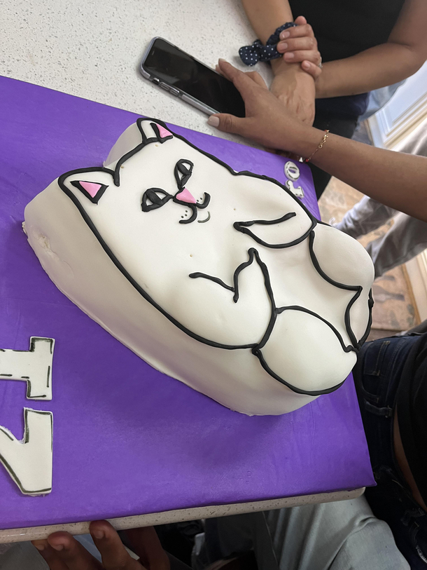 My nephews st birthday cake named Lord Nermal I have no idea what this is