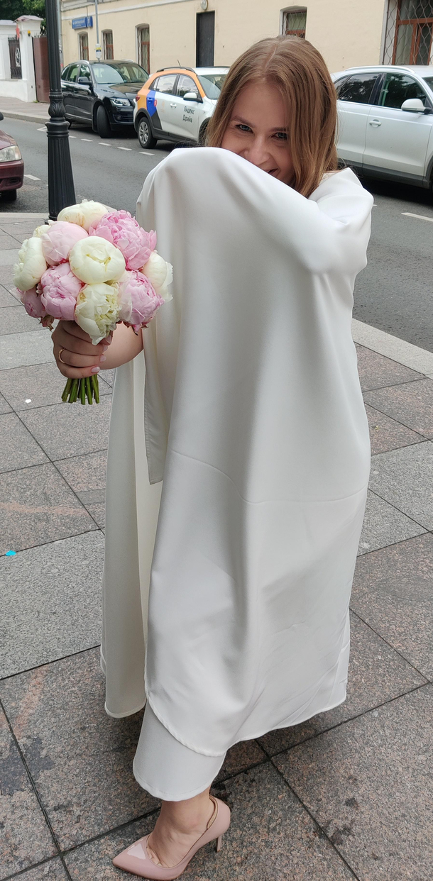 My sister in law wanted a wedding cape So she could pose as a villian during the whole process