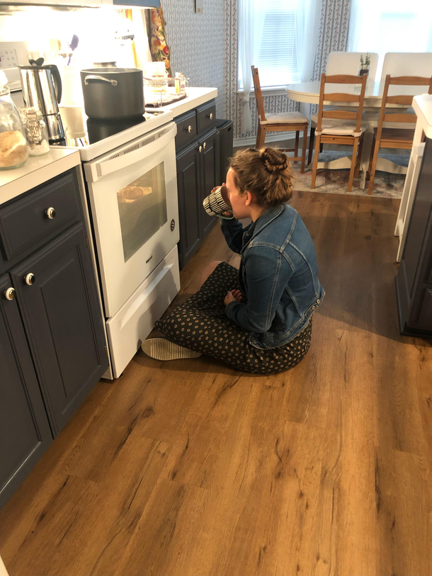 My sister watching her homemade bagels cook