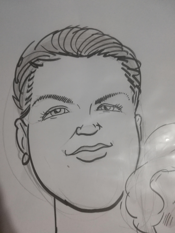 My sisters caricature looks like the secret love child of PNK and Jay Leno