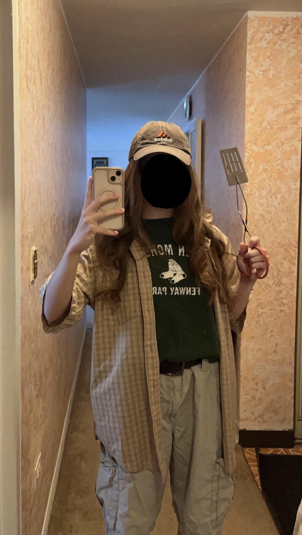 My sisters school was doing bbq dad and soccer mom dress up day I think she nailed the bbq dad look