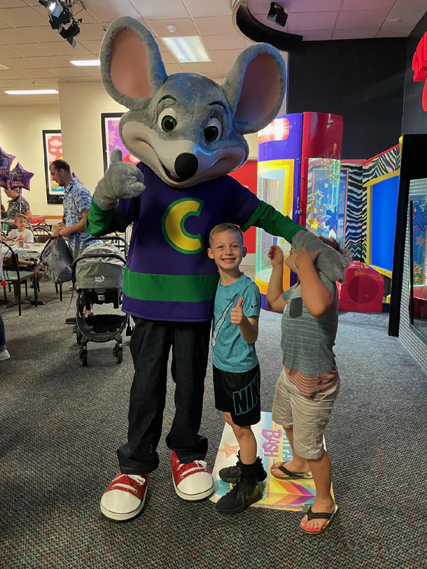 My son asked to take of photo with Chuck E He didnt want his friend lol