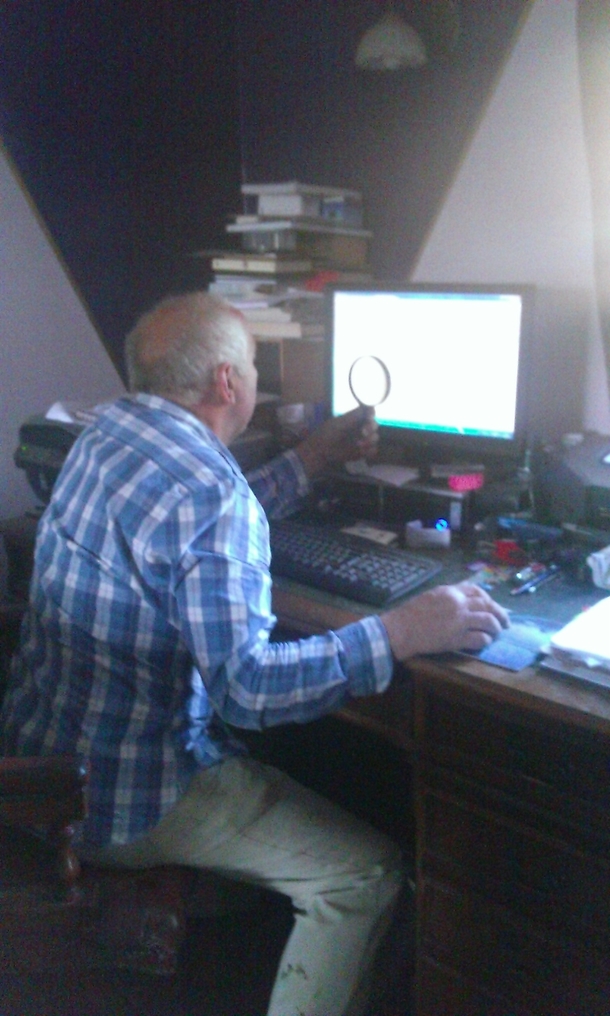 My step dad looking at maps on the pc I did eventually tell him you could zoom in