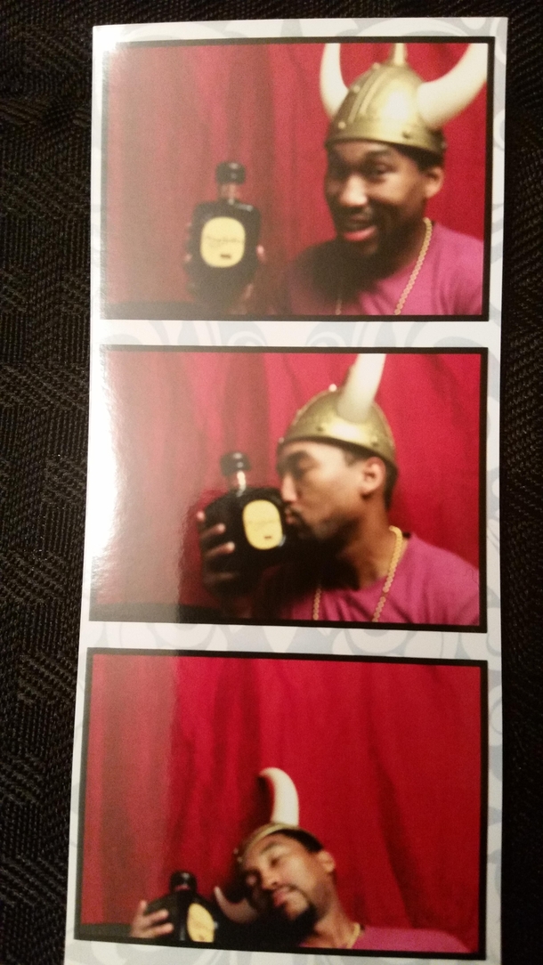 My stepmother hired a photo booth crew for New Years Heres me and my date