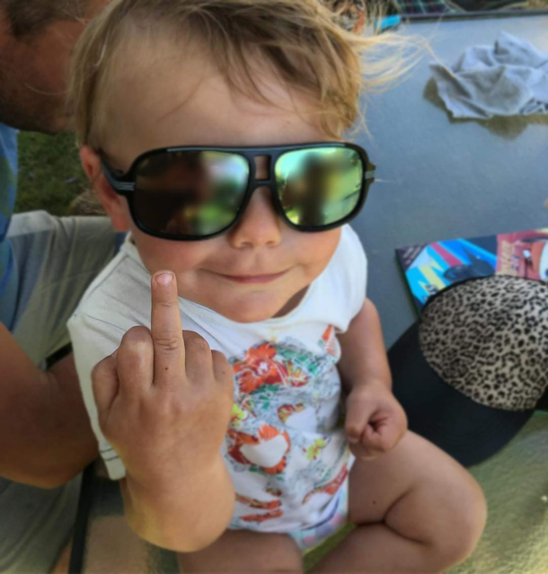 My too cool little relative perfectly timed picture showing his mum the finger he hurt