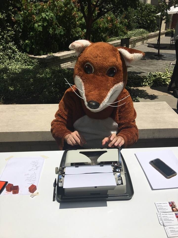 My uncle went out for a walk today and found this costumed fellow writing free poems for people
