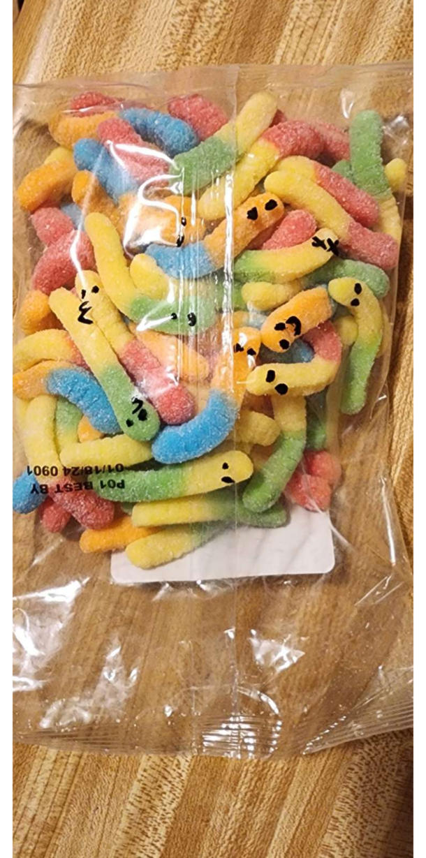 My wife drew faces on my bag of gummy worms