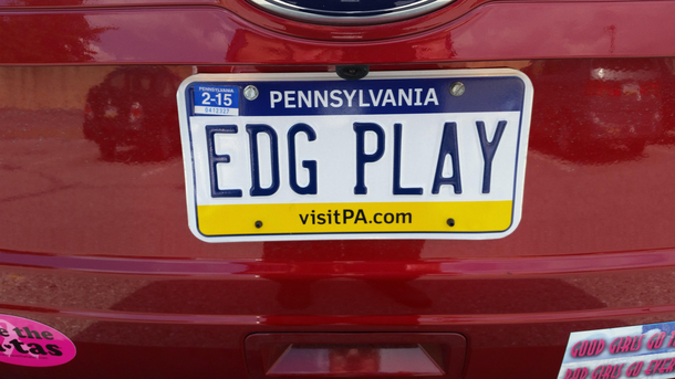 My wifes licence plate on her Ford Edge