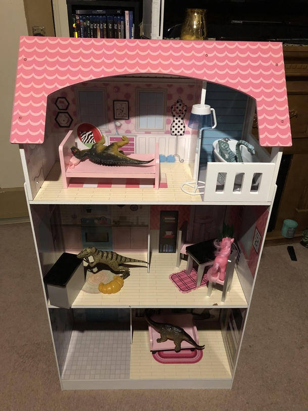My  year old sister loves dinosaurs but my parents got her a dollhouse for Christmas This is what I came home to tonight