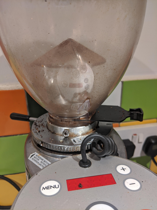 Never noticed this before but there appears to be a Vietnamese robot living inside my coffee grinder