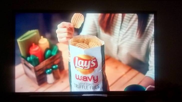 Nice try Lays No one has EVER seen a full bag of potato chips - your ad is false
