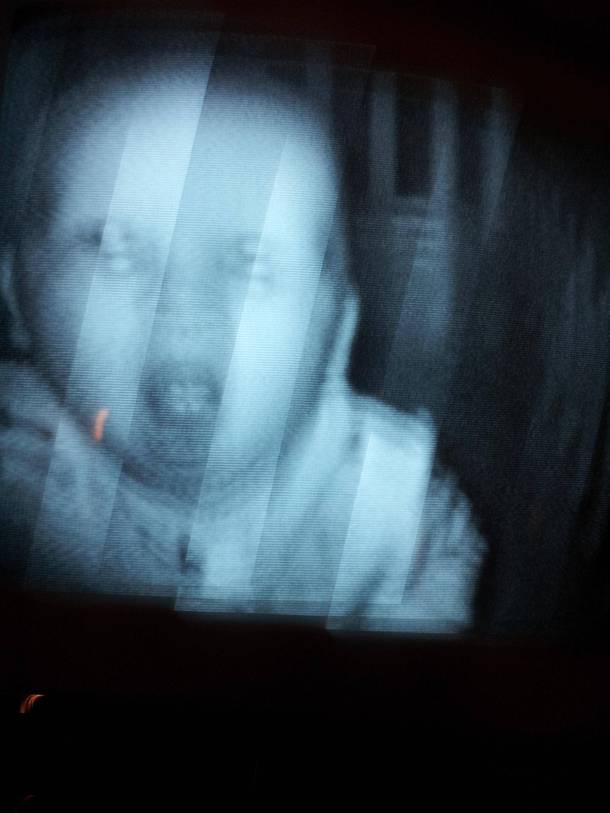 Not sure why your cousin was freaked out by their baby monitor -- this is what shows up on mine every night 