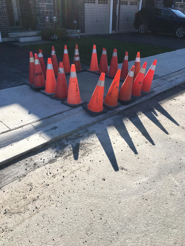 Ok Boss I put the cones around the wet cement Can I go now